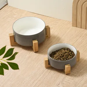Gray ceramic double pet bowls with elevated wooden stands for cats and dogs feeding