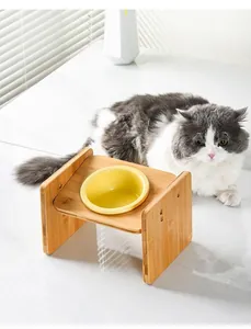 Verstellbarer, neigbarer Futternapfhalter aus Bambus mit gelbem Keramiknapf für Katzen