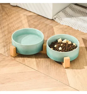 Ciotole doppie rialzate in ceramica con supporto in legno per gatti e cani