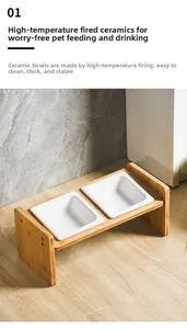 Detail of ergonomic elevated ceramic double pet bowls with stable natural wood stand