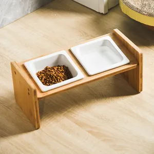 Elevated double ceramic cat bowls with bamboo stand for neck protection and food safety
