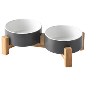Elevated double ceramic cat bowls with natural bamboo stand for ergonomic neck protection