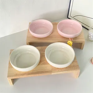 Elevated ceramic pet double bowl set with minimalist wooden stand for cats and small dogs
