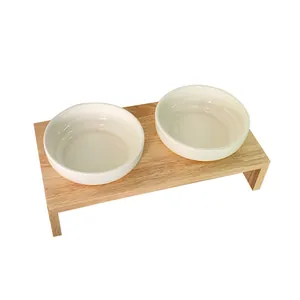 Solid white ceramic double pet bowls with natural wood stand for cats and small dogs