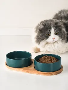 Dual matte ceramic pet bowls with solid acacia wood tray base for cats and dogs