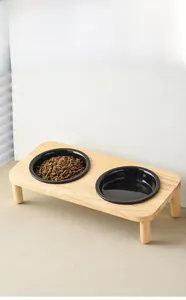 Dual elevated wooden stand with two black ceramic bowls for pet food and water