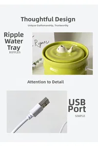 Detail of ceramic pet water fountain featuring whale nozzle and USB power connector