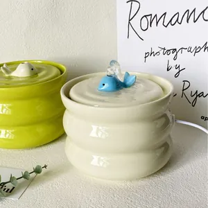 Ceramic whale-style automatic water dispenser for cats and small dogs with ripple design