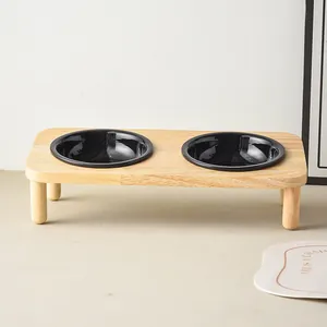 Dual elevated ceramic cat bowls with natural wooden stand for neck protection and stability