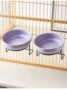Hanging dual purple ceramic pet bowls with sturdy black metal wire rack for cages