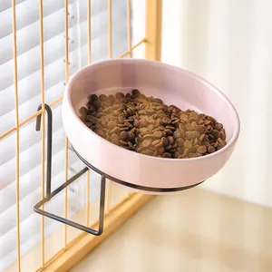 Pink ceramic hanging pet bowl with black metal hook stand for cat or dog food and water