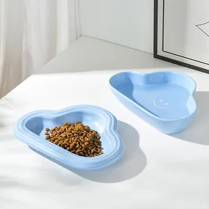 Cloud-shaped light blue ceramic pet bowl set with ripple design and smiley face pattern