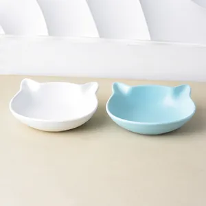 Cat-shaped ceramic bowl set in white and blue matte finish for pet feeding and water