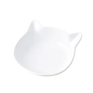 Minimalist white ceramic cat head bowl with cute ear details for pet feeding