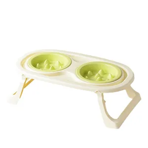 Gamelles anti-glouton vertes avec support blanc pliable pour protéger le cou du chat