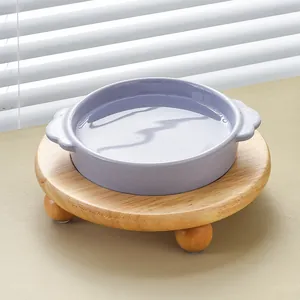 Purple ceramic pet bowl with wooden stand and handles for neck protection and comfort