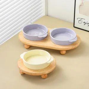 Ceramic cat bowl set with elevated wooden stand for neck protection and shallow pet feeder