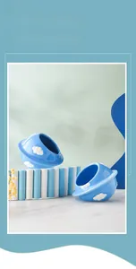 Blue ceramic hamster hideout with white cloud patterns for small pet cooling