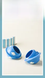 Detail of smooth blue ceramic hamster hideout with clouds and easy-to-clean glaze