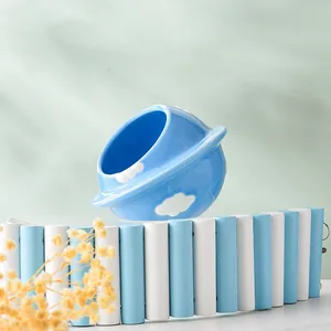 Creative planet-shaped ceramic hamster house in sky blue with cloud pattern and ring