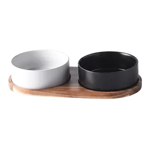 Minimalist ceramic pet bowl set with matte finish and acacia wood tray base