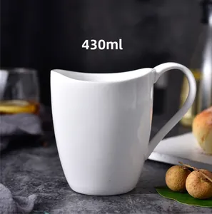 Detailed view of white ceramic mug with wavy rim and ergonomic handle, 430ml capacity