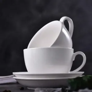 Minimalist white ceramic coffee cup and saucer set with durable glazed finish