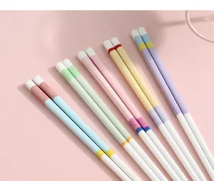 Close-up of premium ceramic chopsticks with macaron colors and geometric textures