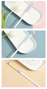Vertical detail of colorful ceramic chopsticks in pastel shades and textured top design