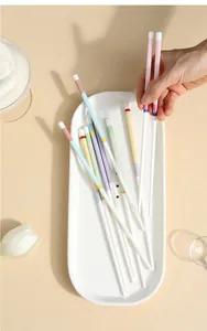 Close-up of colorful ceramic chopsticks in a minimalist Nordic style scene setting
