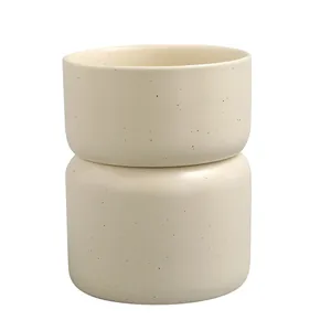 Nordic cream ceramic cutlery holder with black speckled texture and drainage design