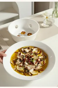 Ceramic warming tureen set with candle base for serving fish soup in restaurants
