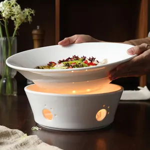 White ceramic food warmer set with candle heating base and large serving plate