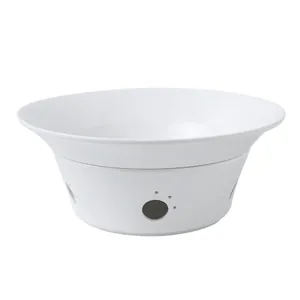Professional white ceramic food warmer with paw-shaped hollow carvings for restaurant use