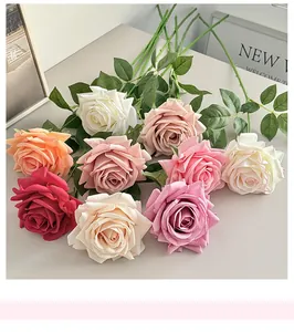 Close-up of artificial moisturizing roses with realistic silk petals in various soft colors