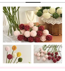 Detailed close-up of realistic colorful pompon chrysanthemum artificial flower bouquet