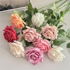 Realistic artificial roses in assorted colors including red and white for home decoration