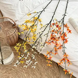 Tall realistic winter jasmine branches in yellow, white, and orange for home floral decor