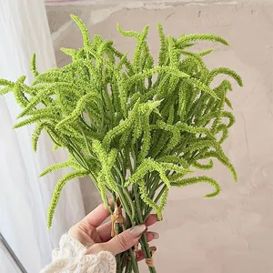 Lush green artificial hanging caterpillar plant for home and hotel interior decoration