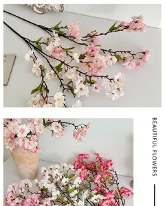 Detailed close-up of realistic pink and white cherry blossom stems for floral decor