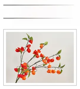Vue détaillée d'une branche de physalis artificielle orange avec des feuilles pour la déco