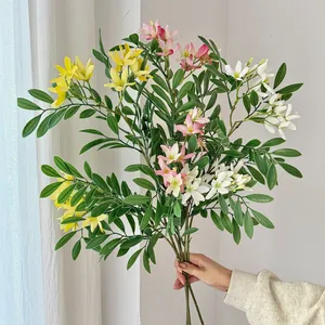 Handheld artificial floral bouquet with pink and white petals for home interior decoration