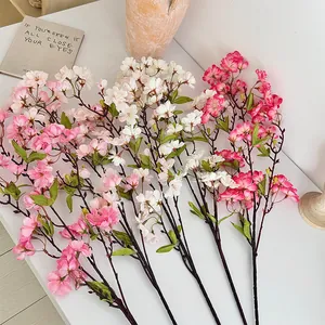 Artificial cherry blossom branches in pink and white for home and wedding decor