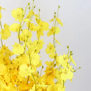 Vibrant yellow dancing lady orchid silk flower spray for home and wedding decor
