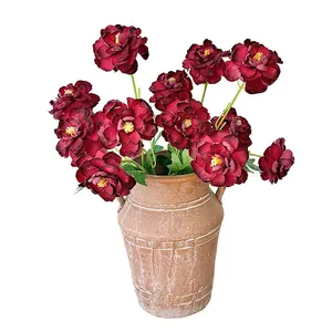 Three-headed burnt lotus artificial flowers in burgundy with vintage ceramic vase decor