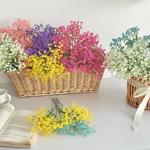 Artificial baby's breath flowers in a woven basket for home and wedding decor