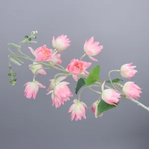 Macro detail of artificial pink yucca flower with realistic silk petals and green buds