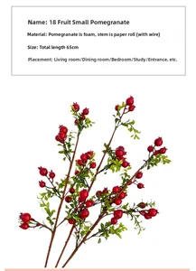 Detail view of 65cm artificial pomegranate branch with 18 red foam berries and paper-wrapped stem
