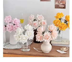 Detail of colorful artificial rose bouquet with lifelike petals and realistic textures