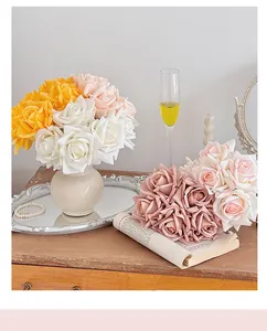 Detail of lifelike moisturizing artificial roses in various colors for home decor
